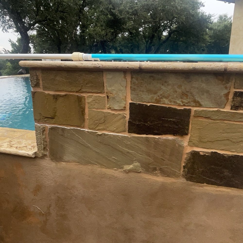 Cody Pools - Calcium line runs along stone, poor construction has water seeping through. - Pool & Hot Tub Service Near Me - San Antonio, Texas Cody Pools - Calcium line runs along stone, poor construction has water seeping through. - Pool & Hot Tub Service Near Me - San Antonio, Texas