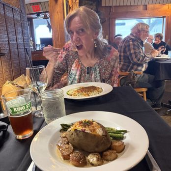 AJ's Old Town Steakhouse - Scallops and a loaded potato with my wife's pasta dish. - Steakhouses Near Me - Homer, Alaska AJ's Old Town Steakhouse - Scallops and a loaded potato with my wife's pasta dish. - Steakhouses Near Me - Homer, Alaska
