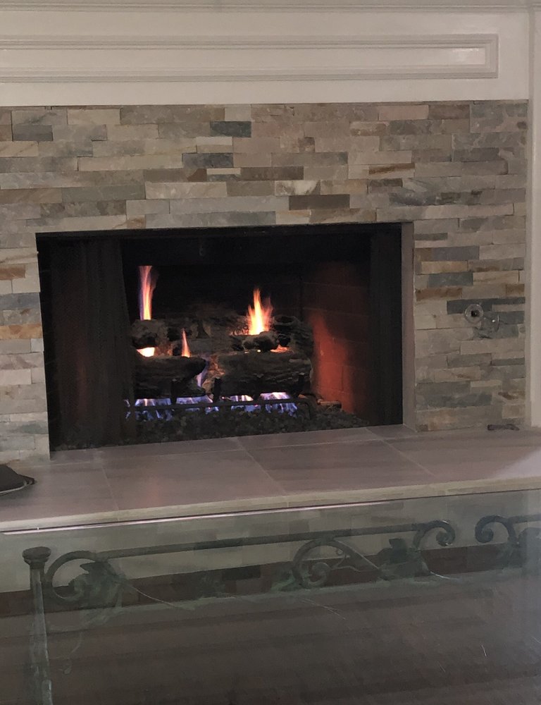 Slide of Jones Customs Roofing