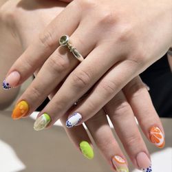 Allure Nails And Spray Tanning - Hand-painted citrus art
