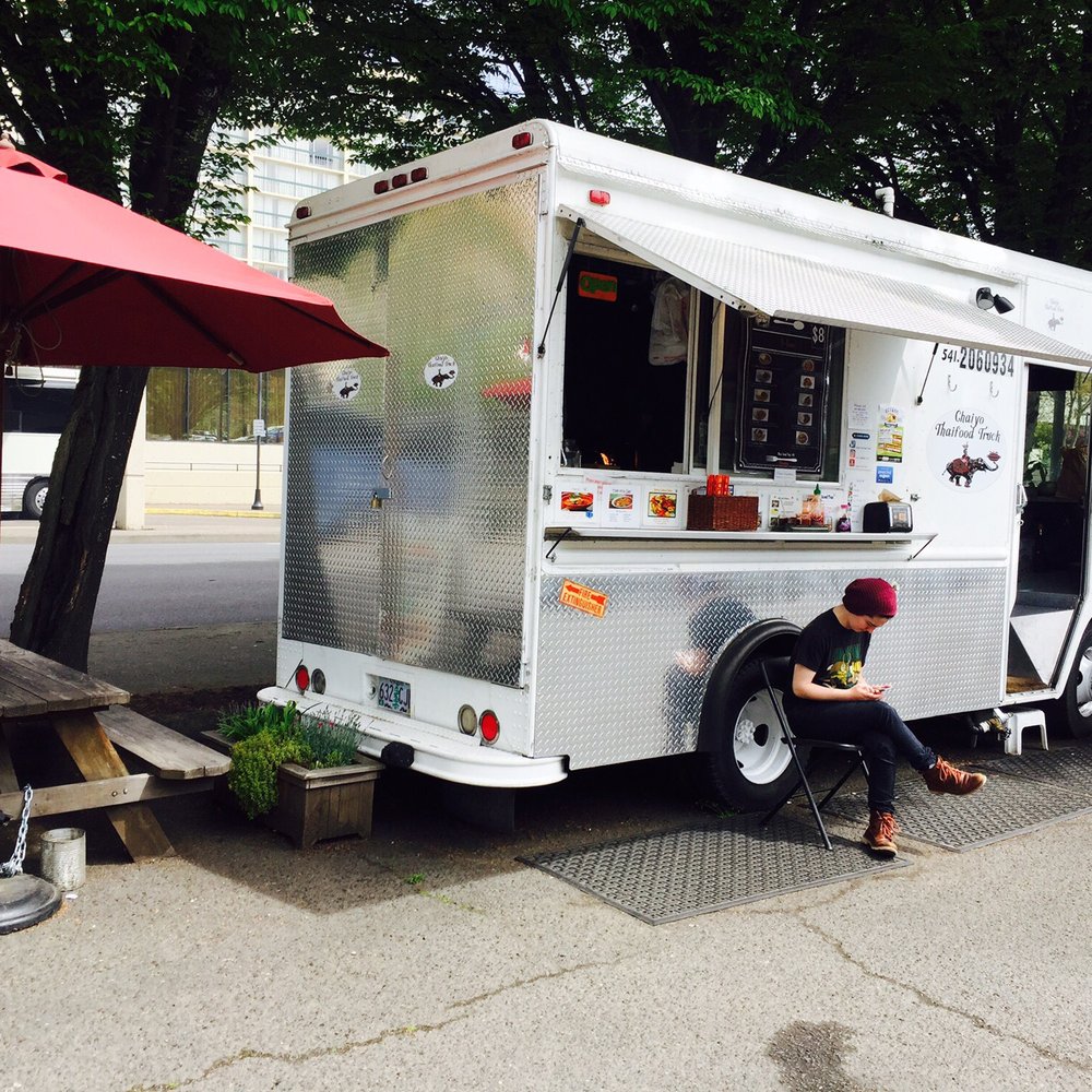 Chaiyo Thai Food Truck - Picnic table if not taking to go. - Food Trucks Near Me - Eugene, Oregon