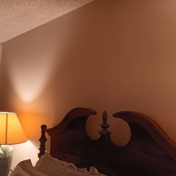 Tru Wall Pro Services - The new drywall behind the bed is painted to blend with the surrounding wallpaper. - General Contractors Near Me - Garden Grove, California Tru Wall Pro Services - The new drywall behind the bed is painted to blend with the surrounding wallpaper. - General Contractors Near Me - Garden Grove, California