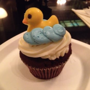 Peabody Deli and Desserts - Red velvet cupcake. The duck was made out of chocolate. - Desserts Near Me - Memphis, Tennessee Peabody Deli and Desserts - Red velvet cupcake. The duck was made out of chocolate. - Desserts Near Me - Memphis, Tennessee