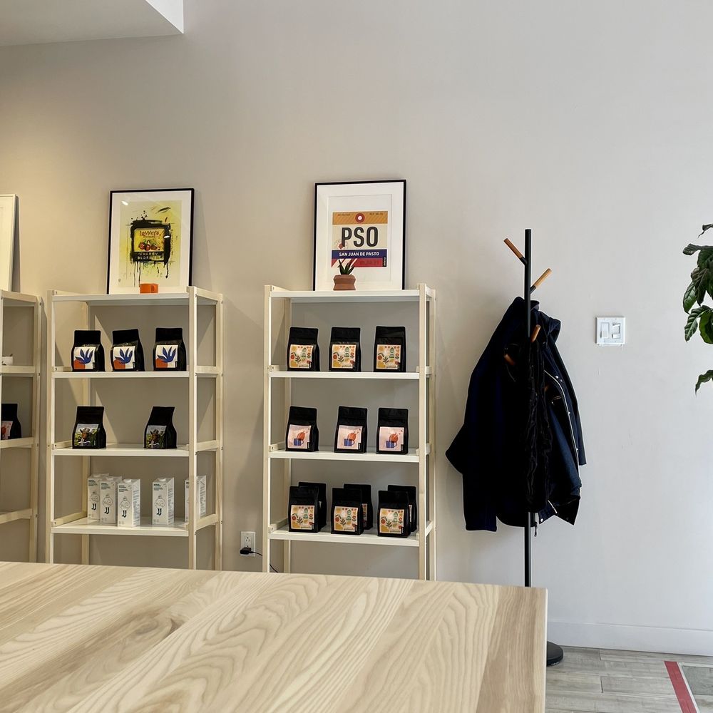 DeTerroir Cafe - One side of the cafe with their beans on display / April 2023 - Coffee Roasteries Near Me - Québec City, Quebec