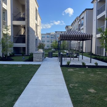 Dakota at Deer Park - The pathway to the gas grills and cooking area - Apartments Near Me - Deer Park, Texas Dakota at Deer Park - The pathway to the gas grills and cooking area - Apartments Near Me - Deer Park, Texas