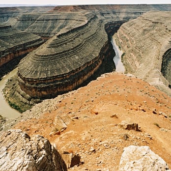 Goosenecks State Park - This shows the outcropping of earth which partly blocks the view, and which has caused frustration to thousands of landscape photographers. - Parks Near Me - Mexican Hat, Utah Goosenecks State Park - This shows the outcropping of earth which partly blocks the view, and which has caused frustration to thousands of landscape photographers. - Parks Near Me - Mexican Hat, Utah