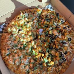 Half Butter Chicken & half Chicken Curry pizza Half Butter Chicken & half Chicken Curry pizza