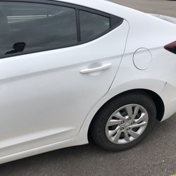 ACE Rent A Car - Supposedly damaged vehicle.  That speck on the back is dirt.