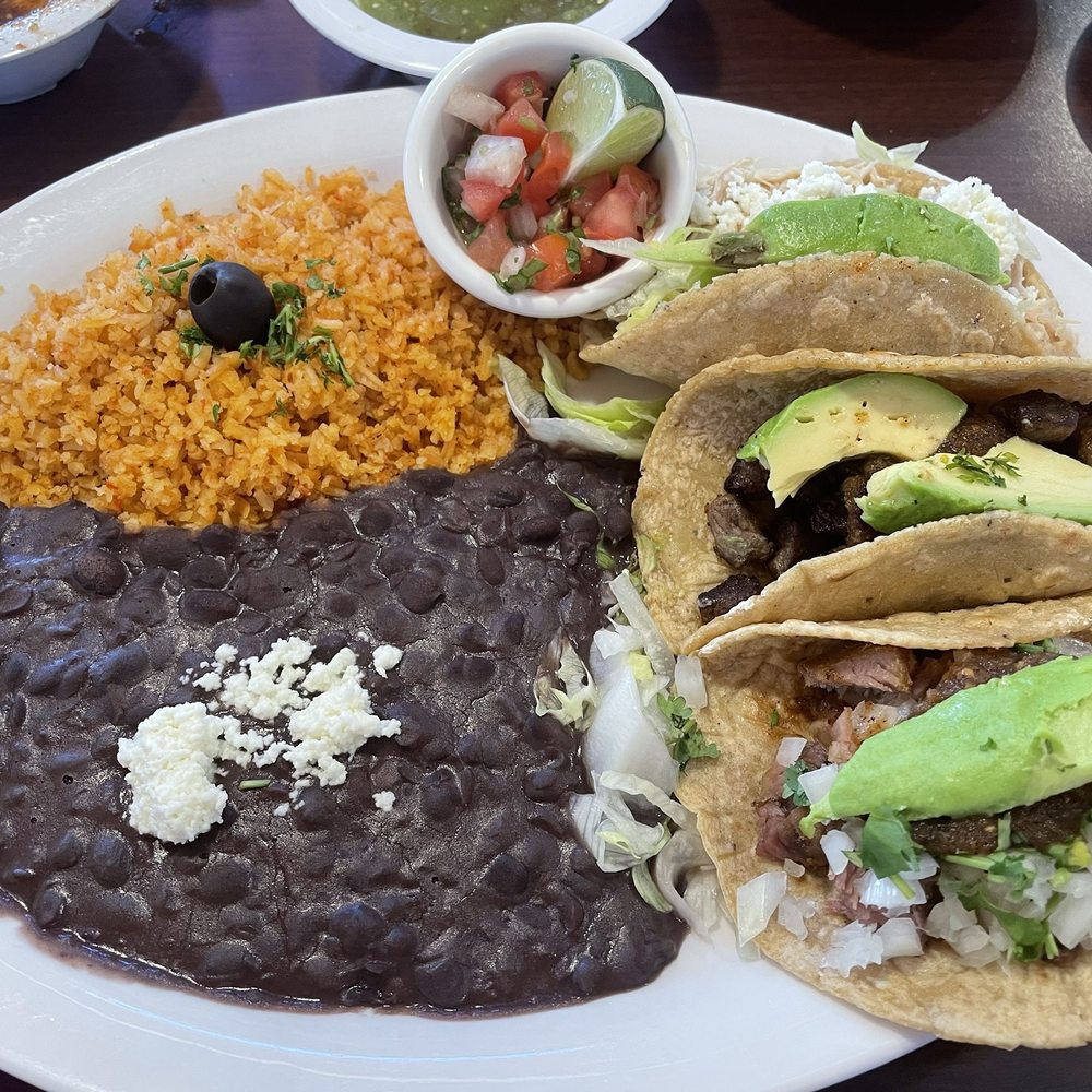 Jarrito Loco - 3 Taco Plate rice & beans  Asada taco , chicken taco & carnitas taco I added avocado - Mexican Near Me - Monument, Colorado