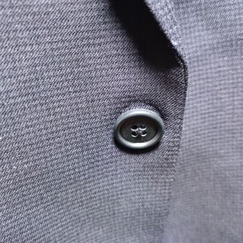 Oxford Cleaners - Button area that now has a permanent imprint on the suit - Laundry Services Near Me - Simpsonville, South Carolina Oxford Cleaners - Button area that now has a permanent imprint on the suit - Laundry Services Near Me - Simpsonville, South Carolina