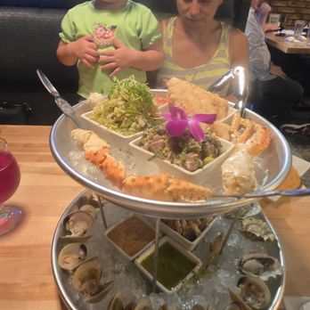 Underground Public House - Their seafood tower. Seafood specials are only on the weekends, and they rotate every week, and sell out quickly. - American Near Me - Carbondale, Illinois Underground Public House - Their seafood tower. Seafood specials are only on the weekends, and they rotate every week, and sell out quickly. - American Near Me - Carbondale, Illinois