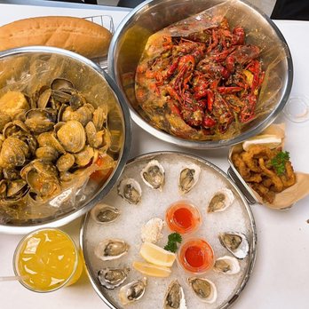 The Crawfish Hut - 2lbs clams, 3lbs crawfish, 1dz oysters and very delicious and crunchy calamari - Seafood Near Me - Burien, Washington The Crawfish Hut - 2lbs clams, 3lbs crawfish, 1dz oysters and very delicious and crunchy calamari - Seafood Near Me - Burien, Washington