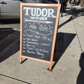 Tudor Wines - a chalkboard sign on a sidewalk - Wine Bars Near Me - Paso Robles, California Tudor Wines - a chalkboard sign on a sidewalk - Wine Bars Near Me - Paso Robles, California