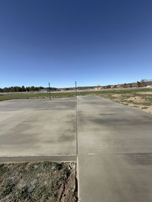LOOKING FOR A NEW CURB OR SIDEWALK? - We can help. We specialize in driveways and Patios.