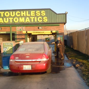 Hub City Car Wash - Attendant spraying for bugs and also the front wheels. - Car Wash Near Me - Rochelle, Illinois Hub City Car Wash - Attendant spraying for bugs and also the front wheels. - Car Wash Near Me - Rochelle, Illinois