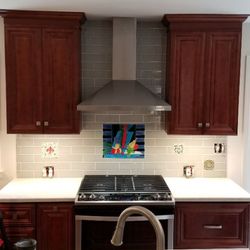 Morin Tile - Backsplash with custom decorative tiles.