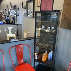 Cowboys Lucky 7 Tattoo - Display jewelry and waiting area.