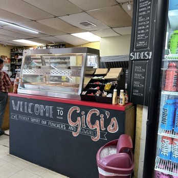 Gigi's - a man standing in front of the counter - Convenience Stores Near Me - Mason, Texas