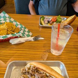 Mushroom Cheese steak and Burger with waffle fries Mushroom Cheese steak and Burger with waffle fries