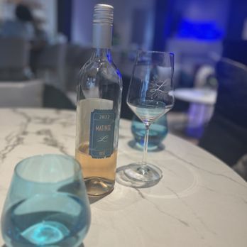 Longoria Wines - a glass of wine and a bottle of wine - Wine Bars Near Me - Santa Barbara, California Longoria Wines - a glass of wine and a bottle of wine - Wine Bars Near Me - Santa Barbara, California