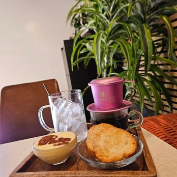 Phin Cafe - Phin Coffee (drip coffee) comes with egg cream and stenciled Phin Cafe lettering - Coffee & Tea Near Me - Fremont, California Phin Cafe - Phin Coffee (drip coffee) comes with egg cream and stenciled Phin Cafe lettering - Coffee & Tea Near Me - Fremont, California