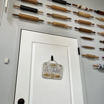 Ellie's - Eclectic wall around the bathroom! - Breakfast & Brunch Near Me - Providence, Rhode Island