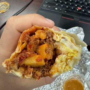 Bagel City Cafe - #4 breakfast burrito (Chorizo, mozzarella cheese, egg, and potato). - Coffee & Tea Near Me - Huntington Beach, California