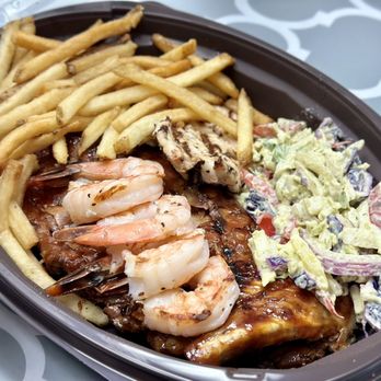Milestones Restaurants - a plate of food on a table - Comfort Food Near Me - Ottawa, Ontario Milestones Restaurants - a plate of food on a table - Comfort Food Near Me - Ottawa, Ontario