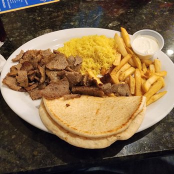 Mad Greek - Gyro platter very good sauce is good wanted more sauce. - Greek Near Me - Johnson City, Tennessee Mad Greek - Gyro platter very good sauce is good wanted more sauce. - Greek Near Me - Johnson City, Tennessee