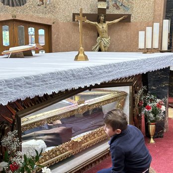 St. Frances Cabrini Shrine - A boy looking at the relics of Mother Cabrini - Churches Near Me - New York, New York St. Frances Cabrini Shrine - A boy looking at the relics of Mother Cabrini - Churches Near Me - New York, New York