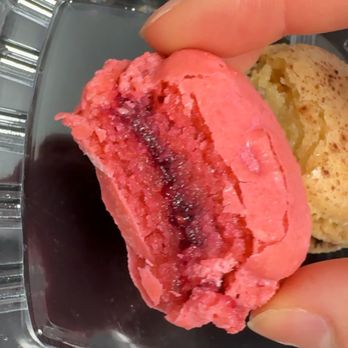 Le Macaron French Pastries - Wet/underbaked raspberry macaron - Macarons Near Me - Long Beach, California