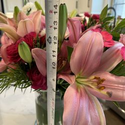 Bloom Flowers & Gifts - 14" tall from bottom of vase to tallest flower. Nothing "premium" about this.