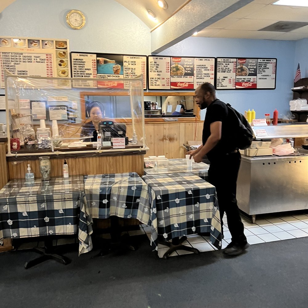 J's Burgers N'more - a man standing at the counter - Fast Food Near Me - Fort Worth, Texas J's Burgers N'more - a man standing at the counter - Fast Food Near Me - Fort Worth, Texas