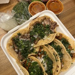 Al pastor, carnitas, and carne asada tacos