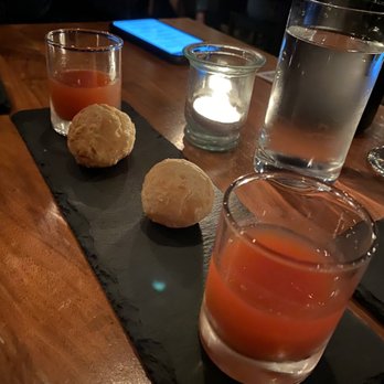 Anomaly SF - Smoked pao de quiejo with a shot of watermelon/cucumber juice - New American Near Me - San Francisco, California