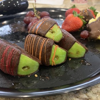 Edible Arrangements - What are those holes? Bugs or where the stick use to be. Either way, no can. Poor presentation. - Gift Shops Near Me - Honolulu, Hawaii Edible Arrangements - What are those holes? Bugs or where the stick use to be. Either way, no can. Poor presentation. - Gift Shops Near Me - Honolulu, Hawaii