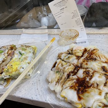 Joe's Steam Rice Roll - Beef Steam Rice Roll with corn, bean sprouts, and scallions (right). Egg crepe with ham (left). - Dim Sum Near Me - Flushing, New York Joe's Steam Rice Roll - Beef Steam Rice Roll with corn, bean sprouts, and scallions (right). Egg crepe with ham (left). - Dim Sum Near Me - Flushing, New York