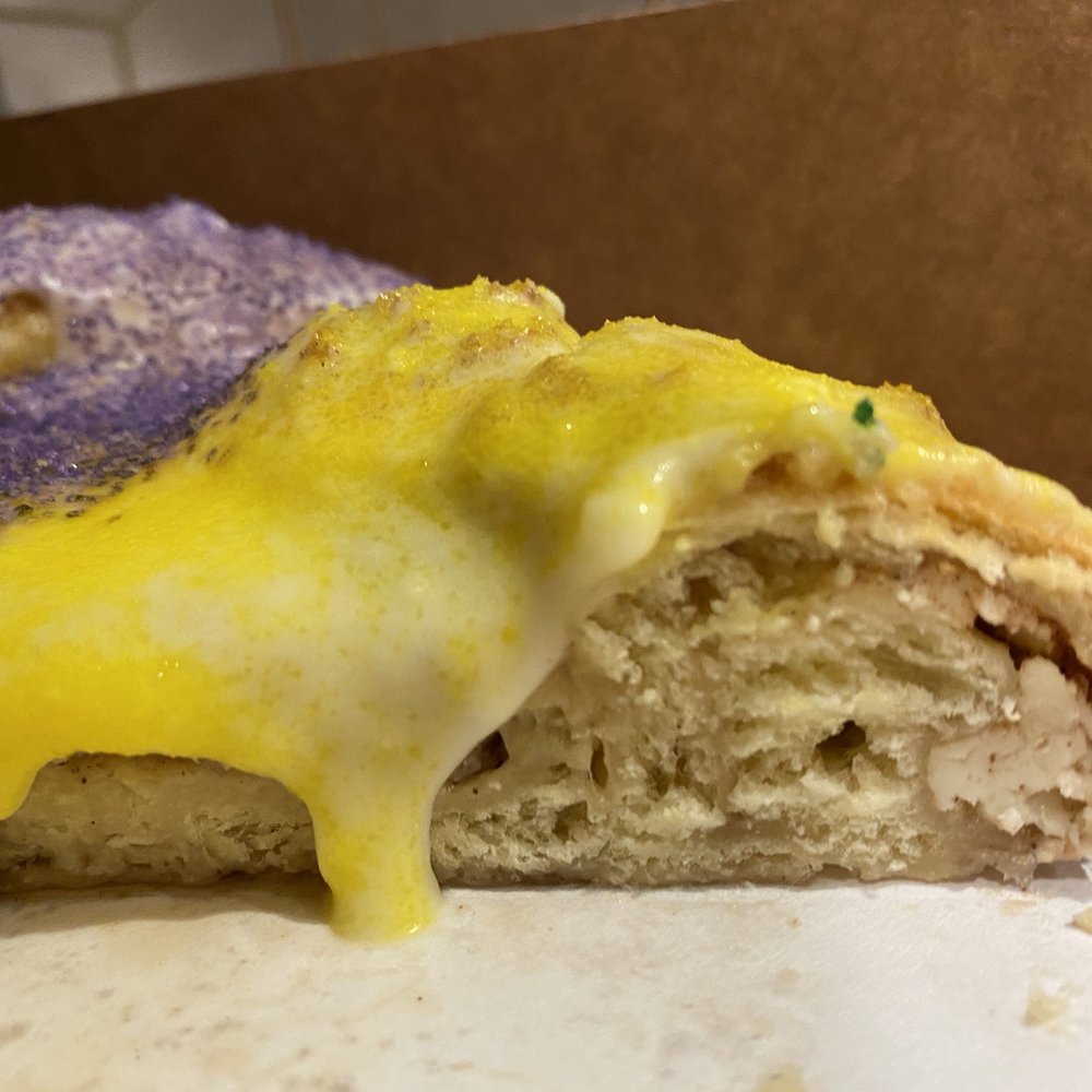 Treme Kitchen - Cream Cheese King cake sliced - Desserts Near Me - Los Angeles , California Treme Kitchen - Cream Cheese King cake sliced - Desserts Near Me - Los Angeles , California
