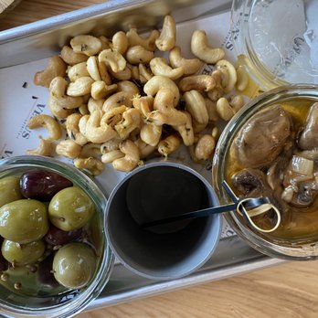 Venus Spirits Tasting Room - Triple bite - rosemary cashews, marinated olives, mushroom conserva - Beer, Wine & Spirits Near Me - Santa Cruz, California Venus Spirits Tasting Room - Triple bite - rosemary cashews, marinated olives, mushroom conserva - Beer, Wine & Spirits Near Me - Santa Cruz, California