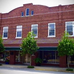 Juniper Tree Massage - Parking can be found on the street in front of the building or in the gravel lot beside the building.