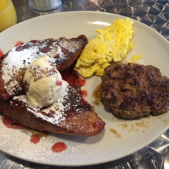 True Flavors Diner - Howling Moon French, scrambled eggs and a pork sausage patty - Diners Near Me - Durham, North Carolina True Flavors Diner - Howling Moon French, scrambled eggs and a pork sausage patty - Diners Near Me - Durham, North Carolina