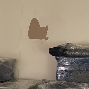 The Moving Pros - Pulled paper off drywall when taking down a picture - Movers Near Me The Moving Pros - Pulled paper off drywall when taking down a picture - Movers Near Me