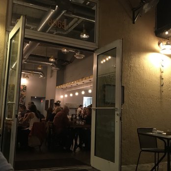 Ghee Indian Kitchen - Indoor area from our outdoor seats - Indian Near Me - Miami, Florida Ghee Indian Kitchen - Indoor area from our outdoor seats - Indian Near Me - Miami, Florida