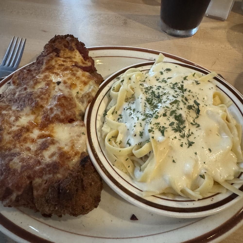 Capri's Italian - Chicken Parmesan with side of Fettuccine Alfredo - Italian Near Me - Simpsonville, South Carolina