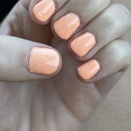 Unclean polish around the cuticles and nicks from harsh filing. Unclean polish around the cuticles and nicks from harsh filing.