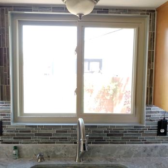 Pluma Construction - a kitchen sink and window - Flooring Near Me - Albuquerque, New Mexico