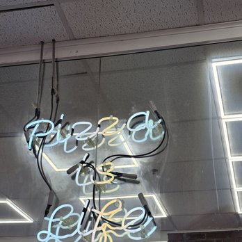 Village Square Pizza - Sign in the Store - Pizza Near Me - New York, New York Village Square Pizza - Sign in the Store - Pizza Near Me - New York, New York