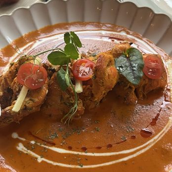Saffron Modern Indian Dining - Buttered chicken main dish - Indian Near Me - Milwaukee, Wisconsin Saffron Modern Indian Dining - Buttered chicken main dish - Indian Near Me - Milwaukee, Wisconsin