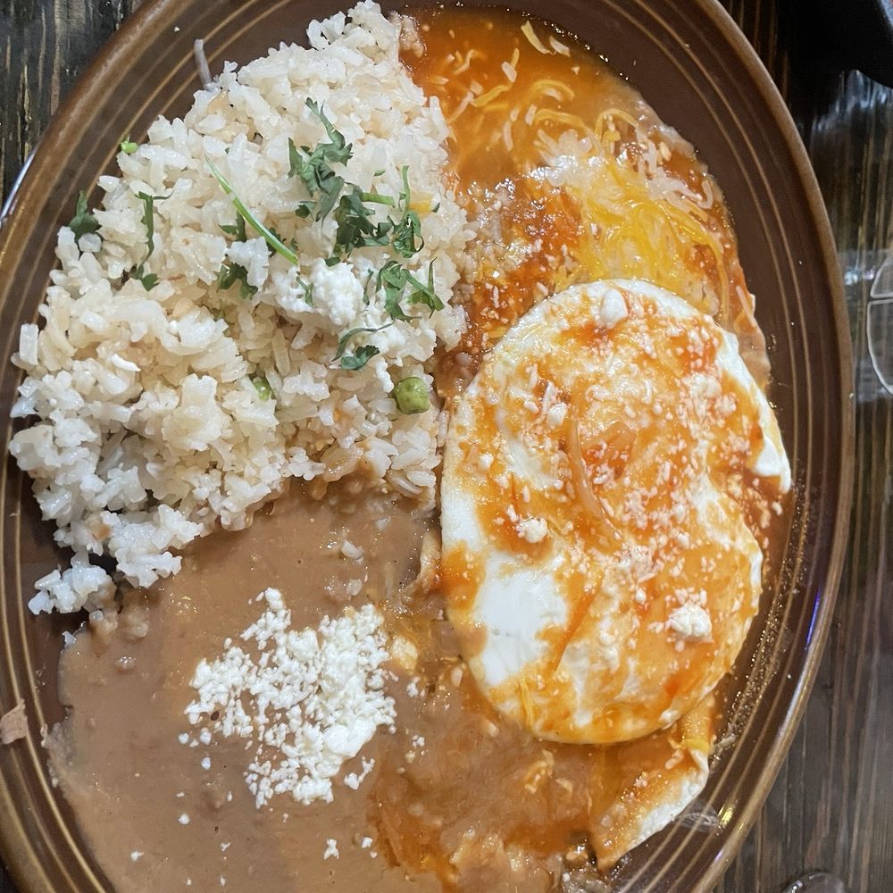 Villa Cantina - Huevos Rancheros, eggs over medium, with cilantro lime rice and refried beans - Burgers Near Me - Arroyo Grande, California Villa Cantina - Huevos Rancheros, eggs over medium, with cilantro lime rice and refried beans - Burgers Near Me - Arroyo Grande, California