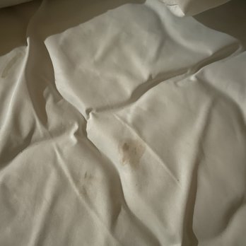 Bayshore Inn - Blood stained flighty sheets and bedding - Hotels Near Me - Ventura, California